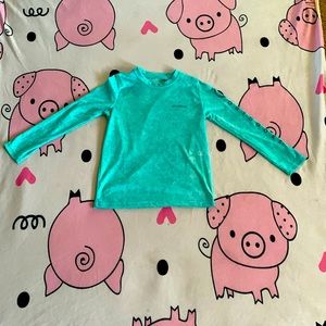 A Magellan Outdoors thin Sun Shirt